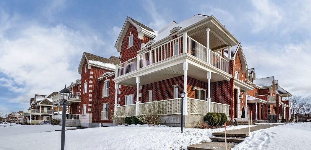 Townhouses in Dollard-des-Ormeaux, QC during winter – professional movers serving local families and residents