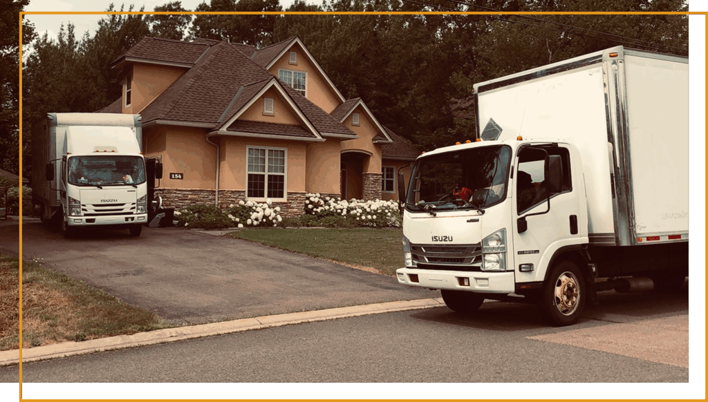 Moving truck from Top Movers Montreal parked outside a residential home in Montreal